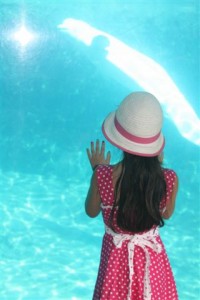 5 year old girl and baby beluga whale