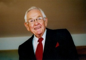 Elderly man in suit