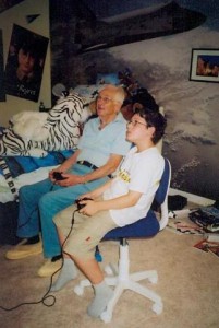 Elderly and teen playing video games