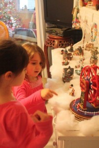 Children looking at our Snowy Village