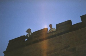 Castle, top of castle, castellation, couple on top of castle, battlement