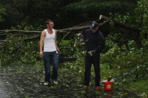 Hurricane Irene  dad and teen boy  dad and teen  dad and teen take down tree