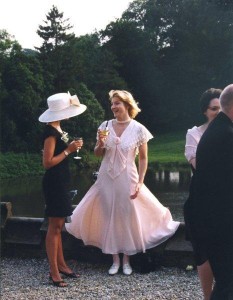 Wedding guests, hats at wedding, dress blowing in wind