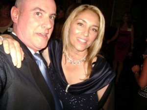 Bianca and Phillip party time gala having fun loving embrace diamond necklace diamond and sapphire neck_