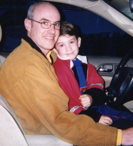 Dad and son in car Dad cuddles son loving dad adorable son sweet father and son