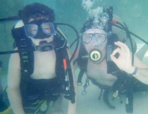 Dad and son scuba diving Caribbean scuba diving scuba diving A-ok
