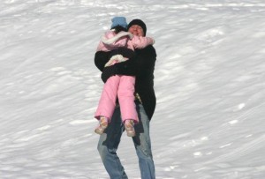 Dad hugs daughter dad embraces daughter dad embraces little one snow hug snow embrace