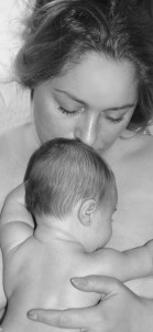 Baby sleeping on mama's chest, mom and baby snuggling, newborn and proud mom