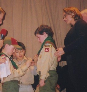 Mom & son, proud mom sees son accept Scounting pin, Boy Scout award, Boy Scout pin, Boy Scout badge
