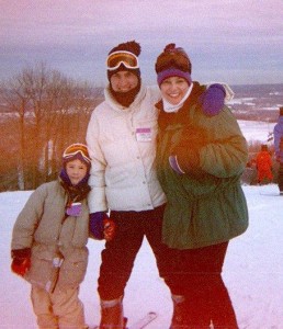 Skiing Family skiing Parents and son skiing ski suits snow suits happy family