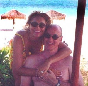 anca & Phillip Bianca Tyler Caribbean tiki huts Turks & Caicos happy couple on beach Honeymoon embrace_