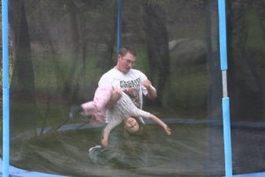 Superhero and Little Petal, Big Brother, little sister, rugged play, trampoline, flipping