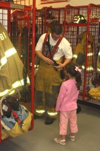 Superhero and Little Petal, Big Brother, little sister, volunteer firefighter team member, strong big brother, looking up to brother