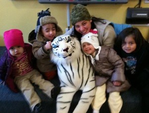 Tiger, Siberian tiger, blue-eyed tiger, students, enrichment program, enrichment school program, teacher with students, teacher and students and tiger, centerpiece of classroom, buddy for reading